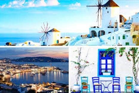 A picture containing outdoor, sky, water, windmill

Description automatically generated
